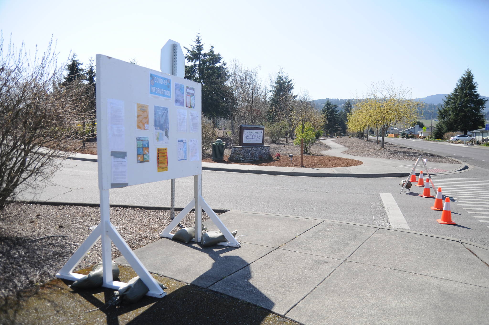 The City of Sequim has several billboards set up with paper postings of update emergency information. Sequim Gazette photo by Michael Dashiell