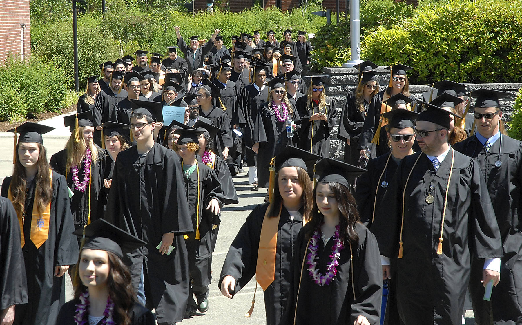Students march to commencement ceremonies on the Port Angeles campus of Peninsula College in 2017. File photo by Keith Thorpe/Olympic Peninsula News Group