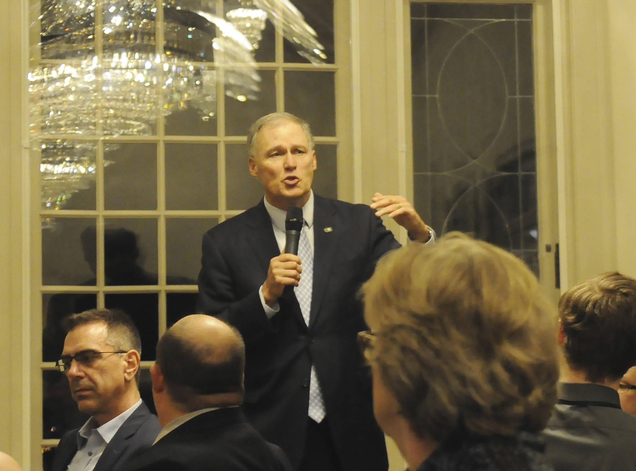 Gov. Jay Inslee talks with members of the media at the Governor’s mansion in Olympia in February 2018. Inslee said Washington state residents can expect to be dealing with the 2019 novel coronavirus for several months until a vaccine can be developed and widely distributed. Sequim Gazette file photo by Michael Dashiell