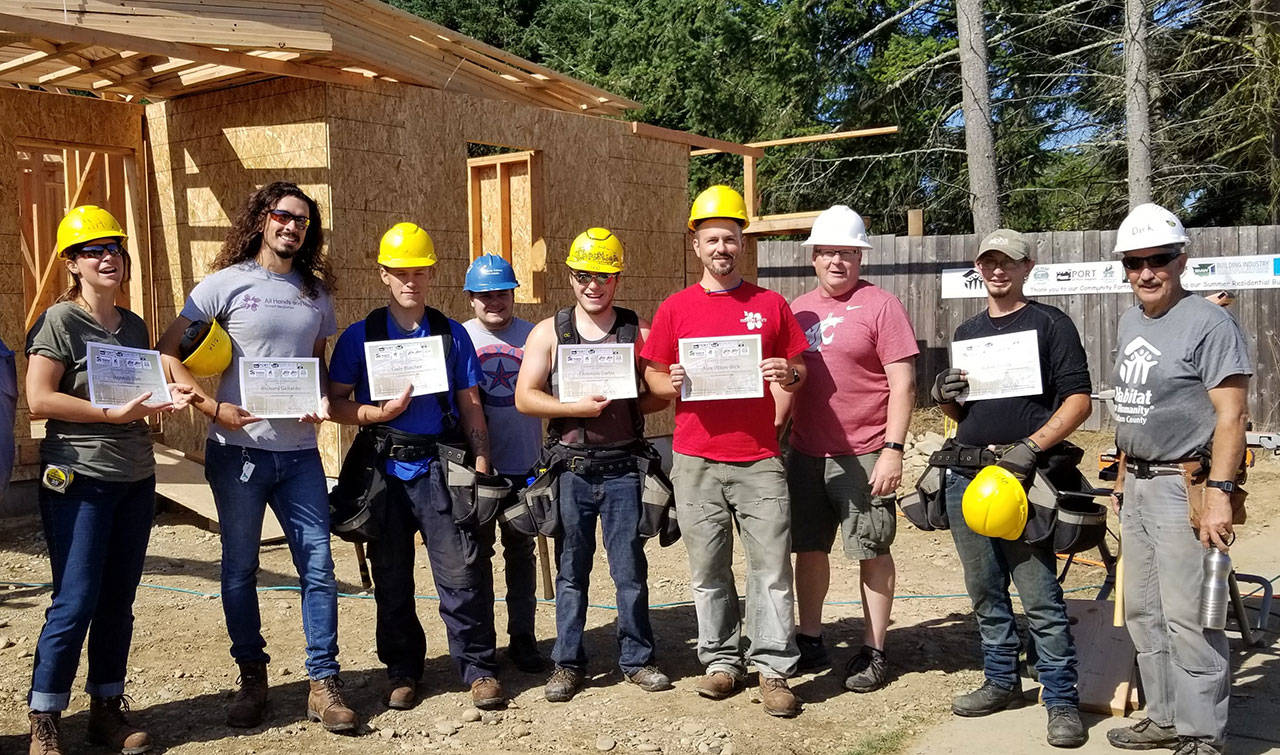 Participants in Habitat for Humanity of Clallam County’s 2019 Summer Build Class program celebrate their last day of hands-on instruction. Registration is open for the 2020 program. Photo courtesy of Habitat for Humanity of Clallam County