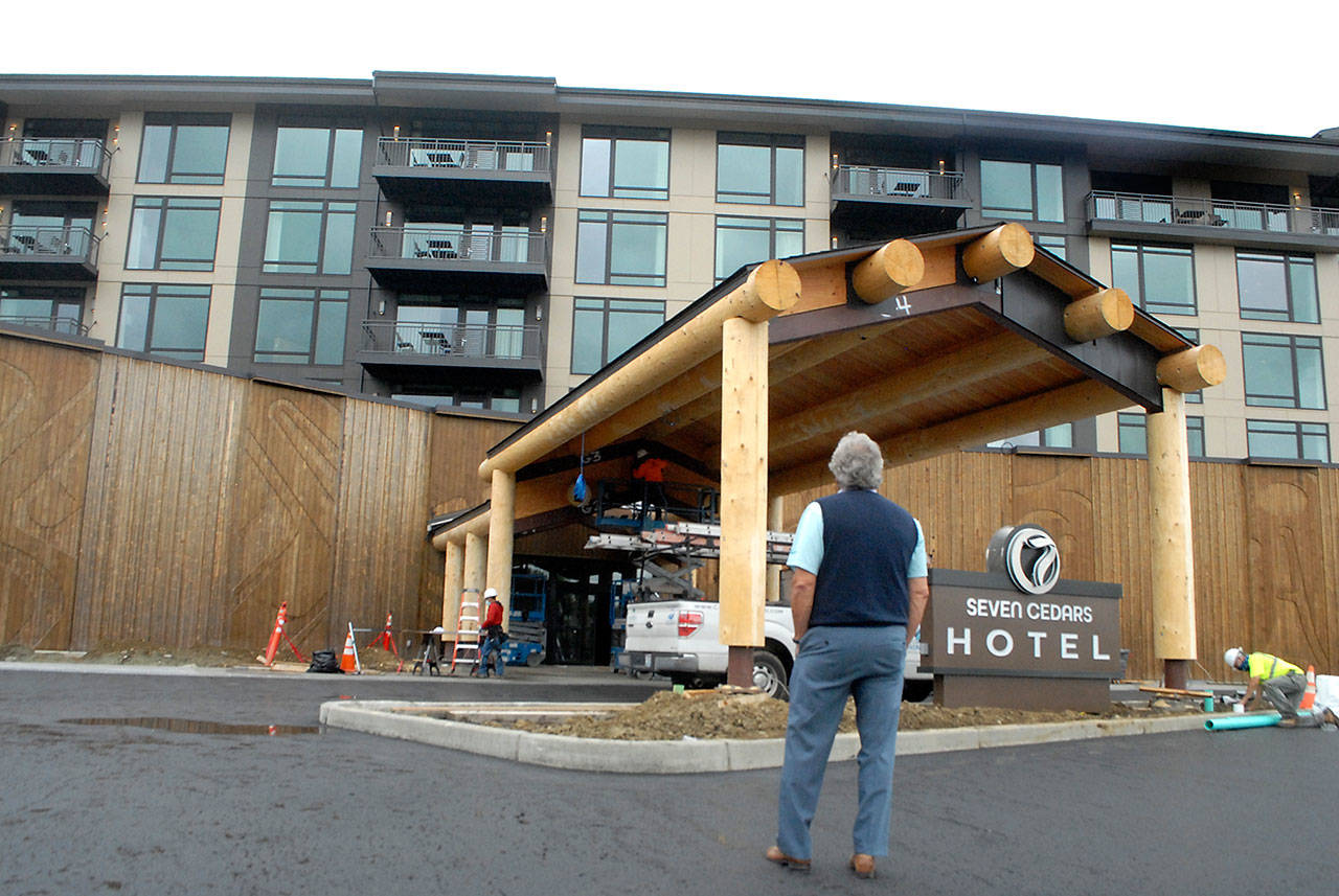 Jerry Allen, chief executive officer of 7 Cedars Casino and Hotel, looks up at the outside of the resort’s main entrance on July 7 as the building nears completion. Photo by Keith Thorpe/Olympic Peninsula News Group