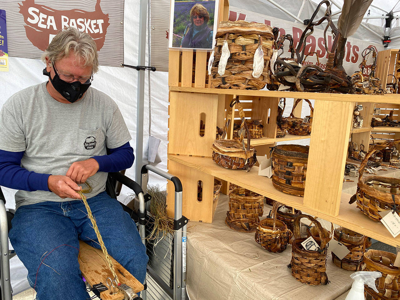 Greg Gundy of Sea Basket Farm is busy at work this past weekend at the Sequim Farmers & Artisans Market. Photo by Emma Jane Garcia