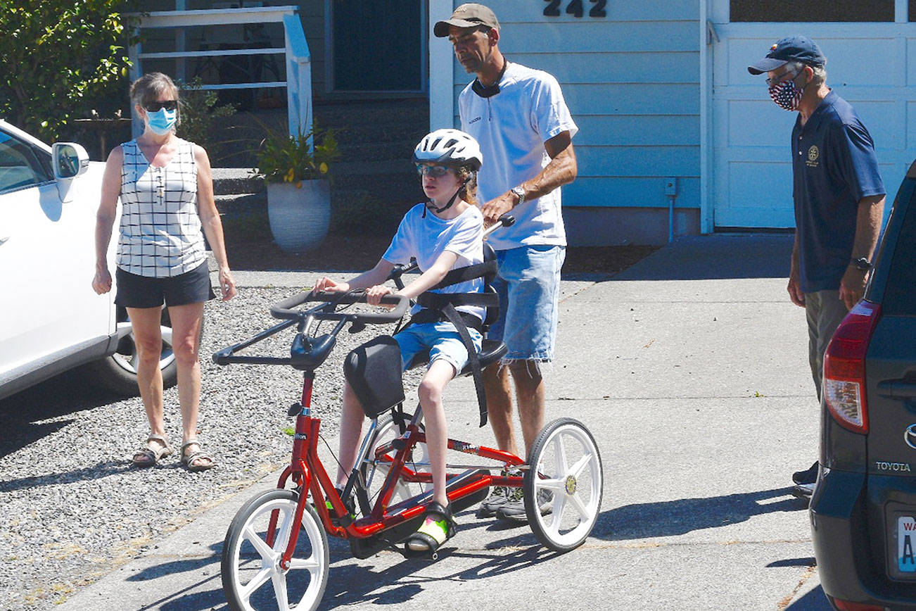 Milestone: Sequim Noon Rotary gifts adaptive bike steering bar