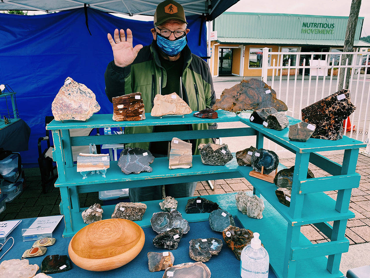 Don Daman of Don’s Rocks and Wood displays his rocks, minerals, gems and petrified wood at the Sequim Farmers & Artisans Market. Photo by Emma Jane Garcia