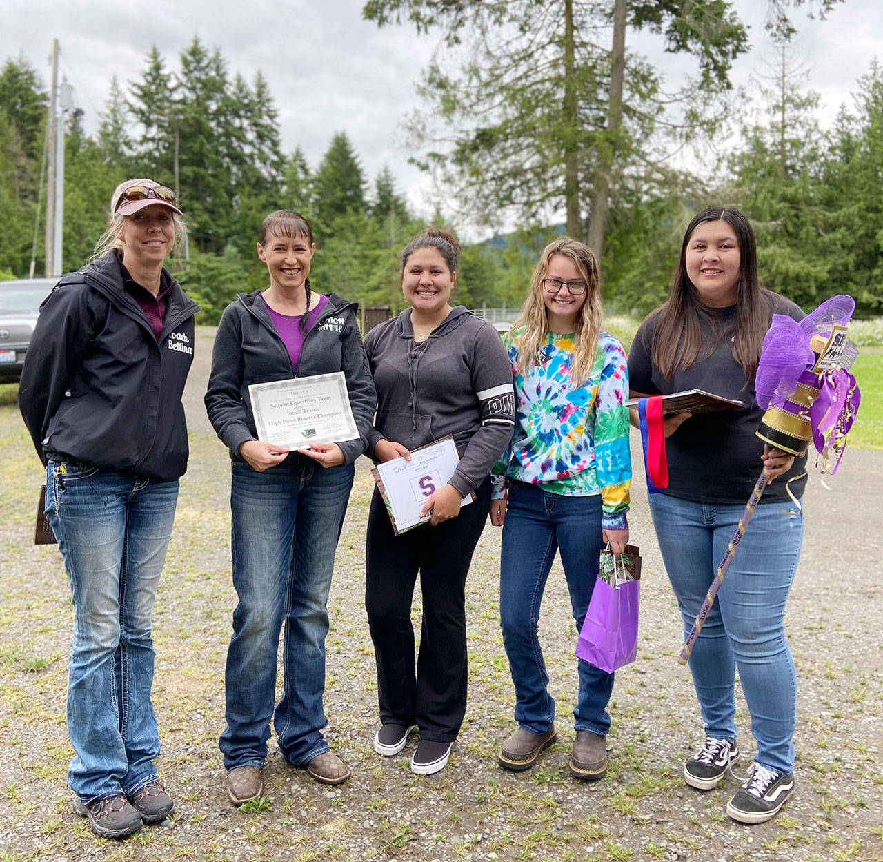 The Sequim Equestrian Team is looking to build its roster for the 2020-2021 season. Pictured, from left, are coaches Bettina Hoesel and Katie Newton, team members Abby Garcia, Keri Tucker and team captain Lilly Thomas. Submitted photo