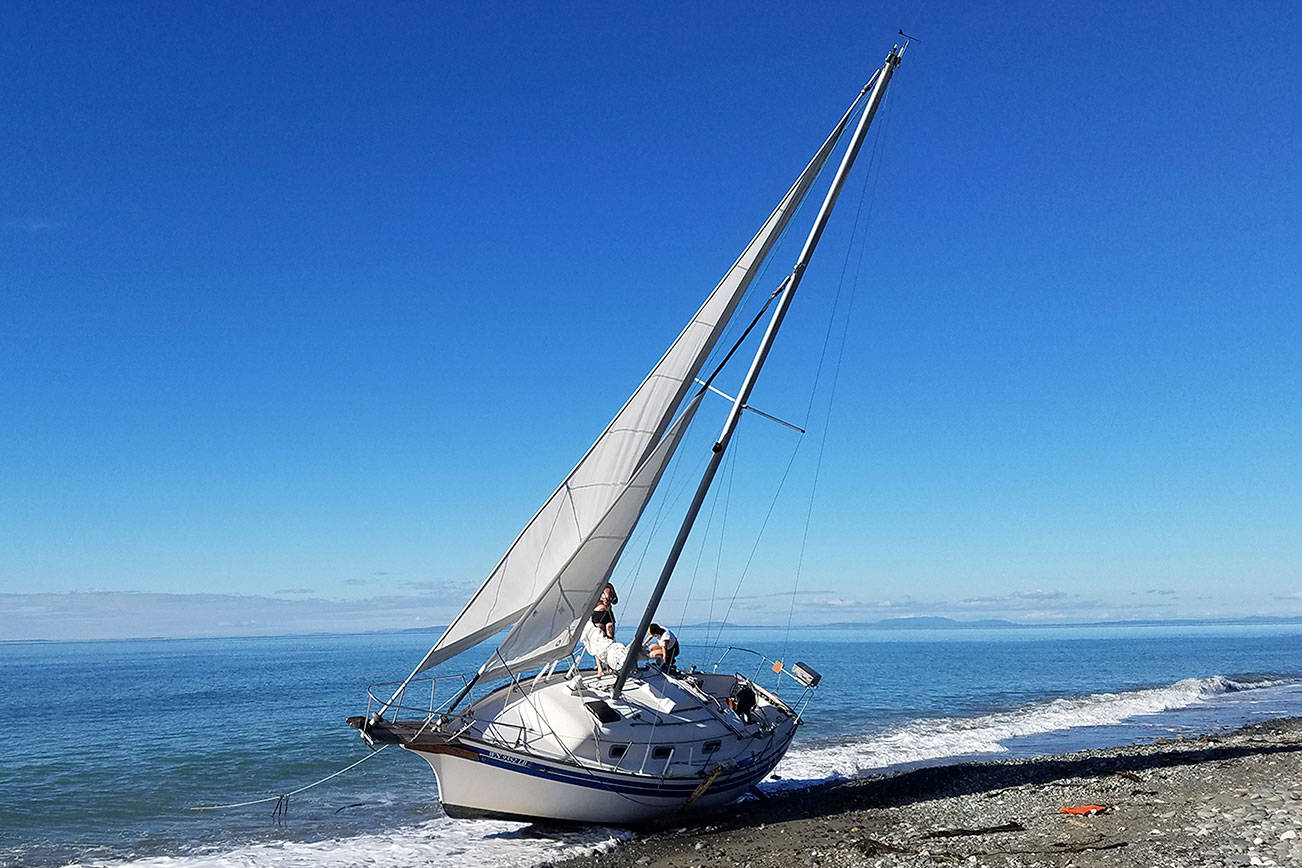 Sailboat stranded on Dungeness Spit