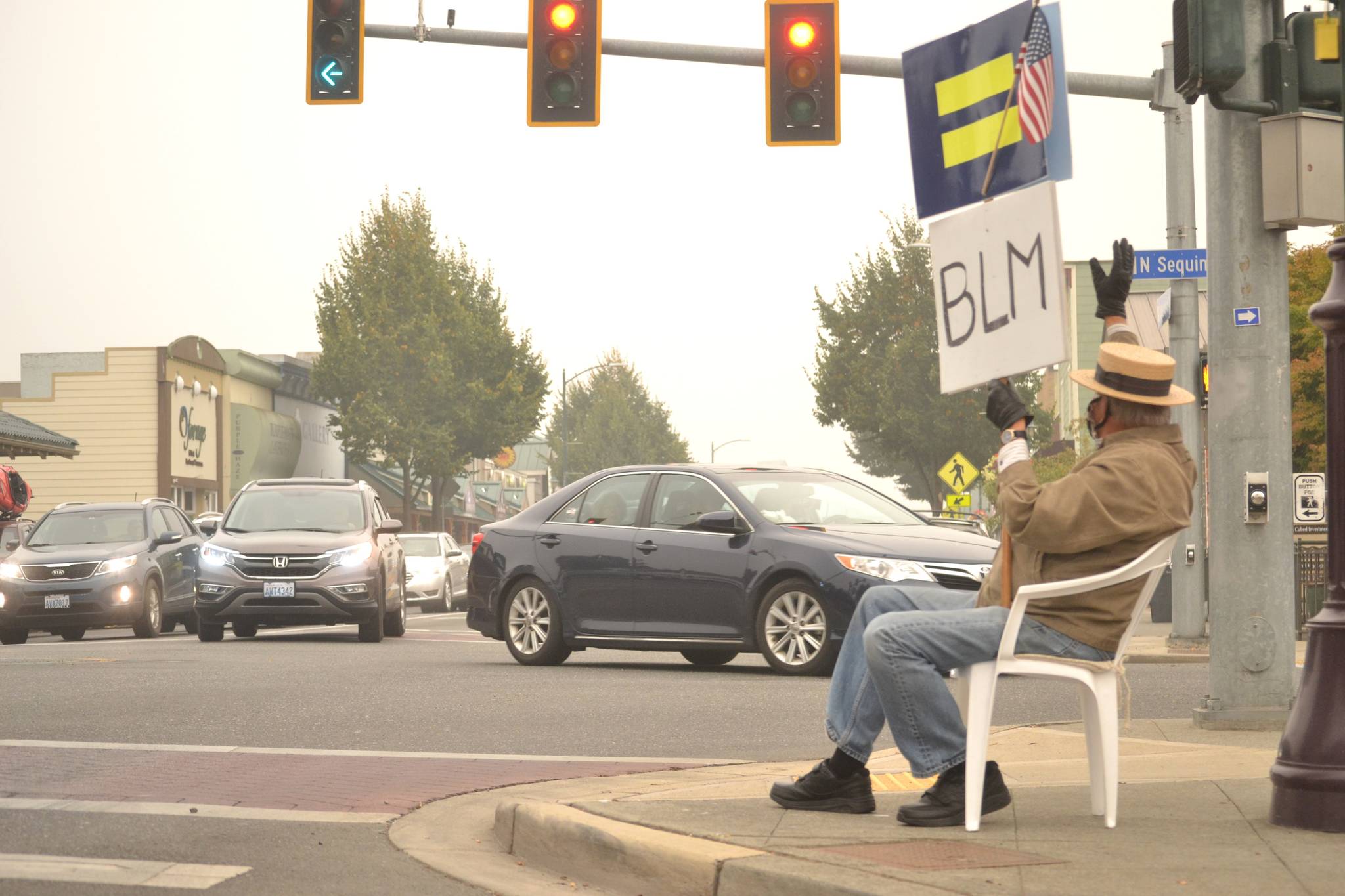 For more than 110 consecutive days, Sequim’s Neil Morris has set aside 3-plus hours to wave and hold signs showing his support for Black Lives Matter and the Human Rights Campaign. “I just want people to be aware,” Morris said. “I don’t know what else I could do. I piss off a lot of people and I think that is a good thing.” Sequim Gazette photo by Matthew Nash