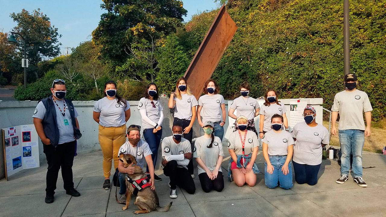 AmeriCorps Volunteers visit the 9/11 Memorial Park in Port Angeles from 9:11 a.m. to 9:11 p.m. on Sept. 11, holding a vigil and cleaning up the park in honor of those lost, as part of United Way of Clallam County’s 2020 Annual Campaign. Volunteers with the Olympic Peninsula Rowing Association were also on site to beautify the park and donate time. Submitted photo