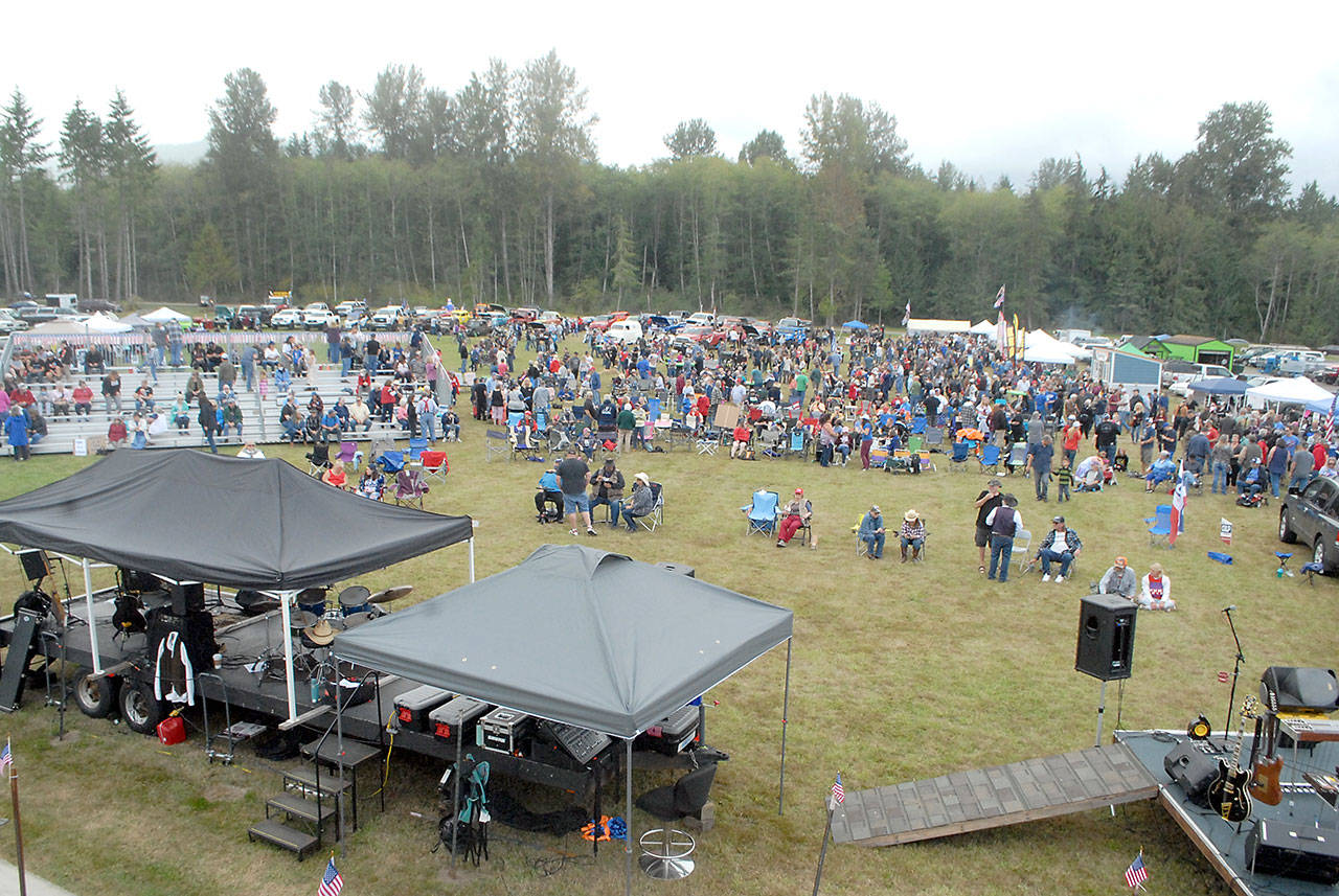 A crowd numbering in the hundreds gathers to hear a slate of speeches by state and local Republican candidates and live music on Saturday at Extreme Sports Park west of Port Angeles. Photo by Keith Thorpe/Olympic Peninsula News Group