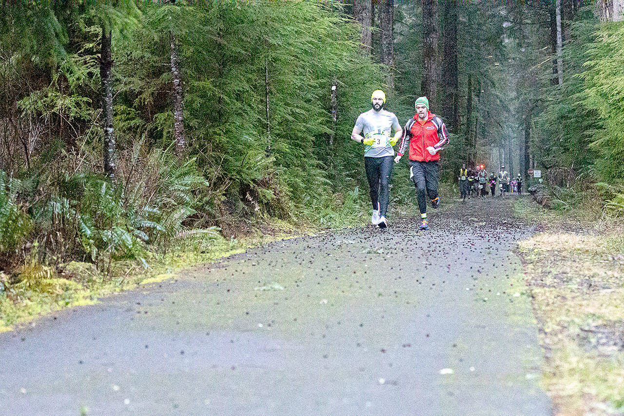 A member of Atlas Athletes from Olympia leads the pack at the second annual Frosty Moss relay race held along the Olympic Peninsula in early March. The COVID-19 ended pretty much all outdoor running and cycling races in the state. Photo by Matt Sagen