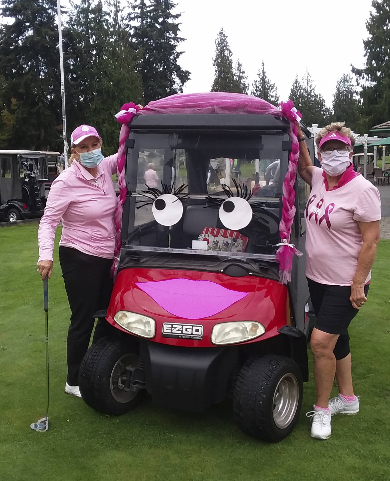 Judy Flanders, left, and Cheryl Coulter celebrate a successful 2020 Drive for the Cure golf tourney at Sunland Golf & Country Club. Submitted photo