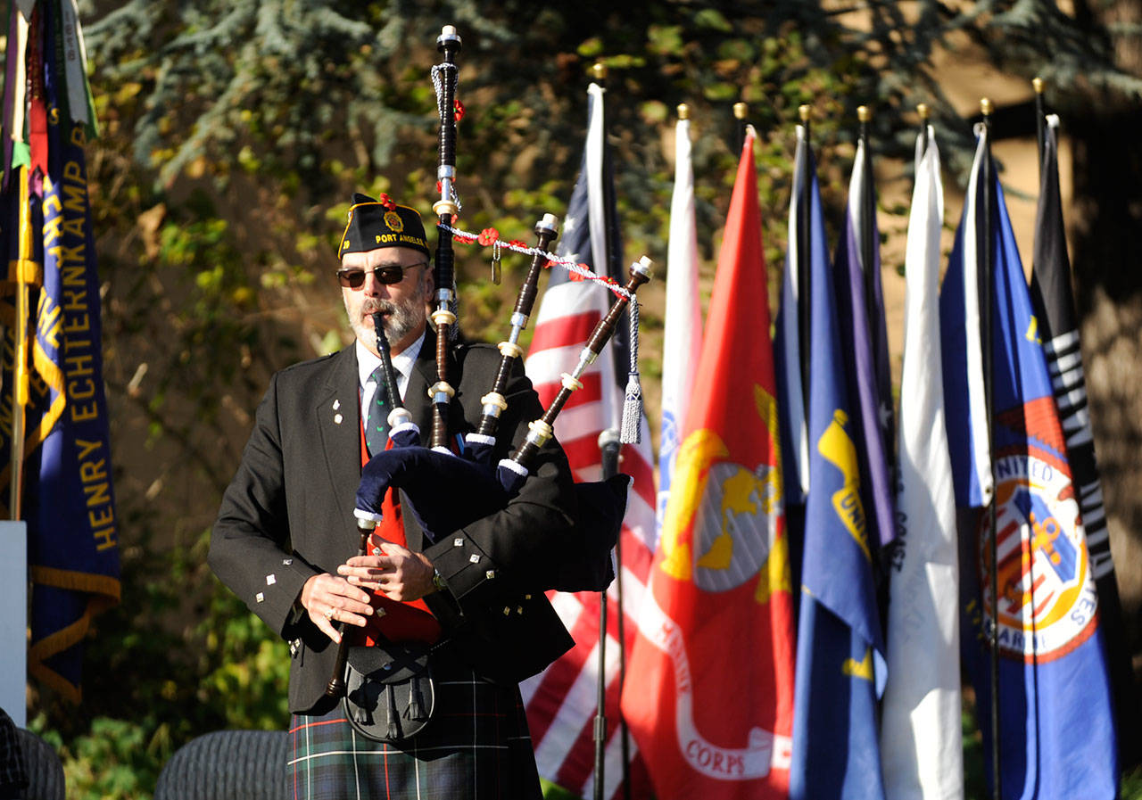 Bagpiper Rick McKenzie plays for the crowd at a Veterans Day ceremony at Pioneer Memorial Park in Sequim on Nov. 11.