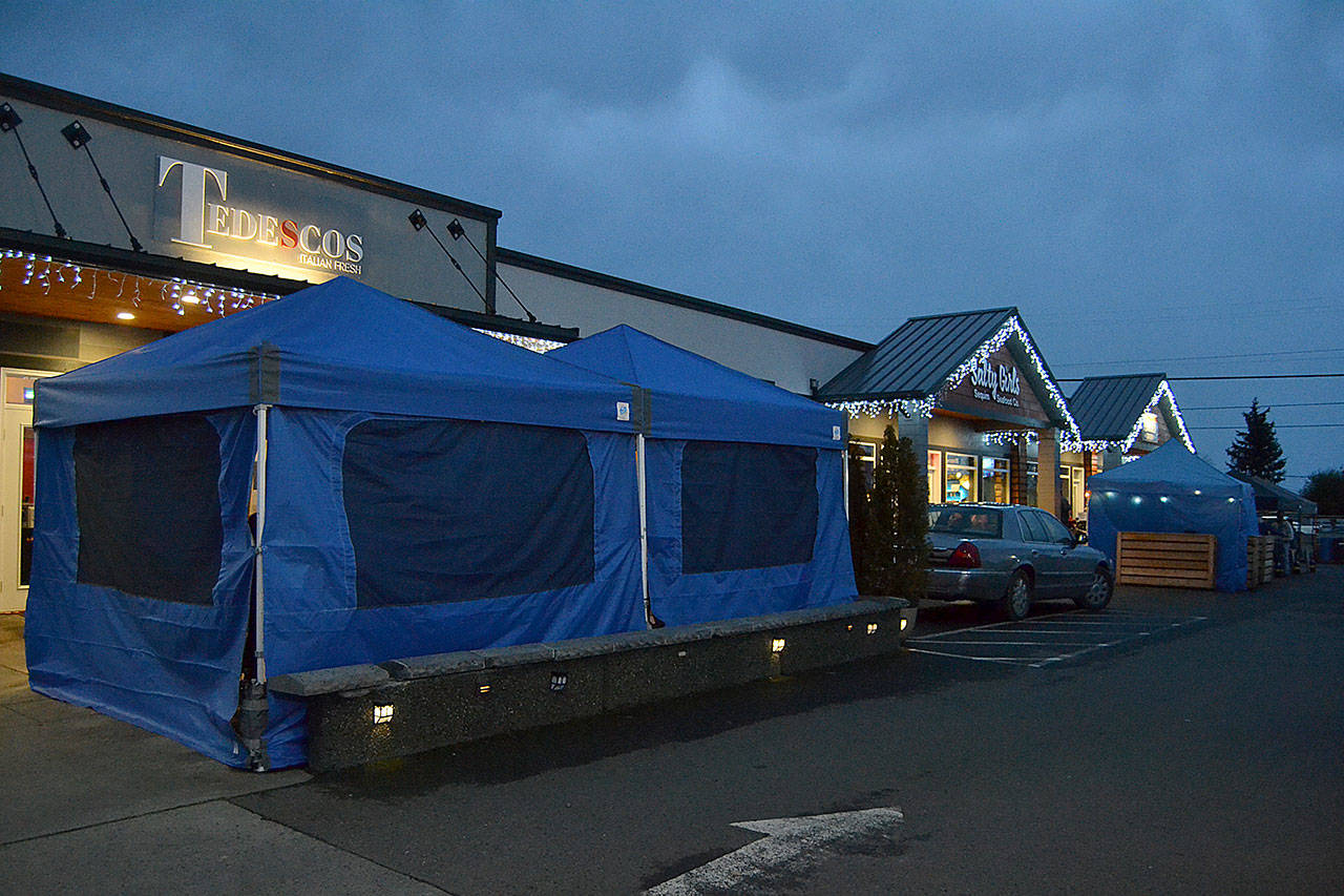 A new program through the City of Sequim provides information for eateries looking to set up outside dining under canopy tents. Barry Berezowsky, director of the Department of Community Development, said permits aren’t required but city staff need a plat drawing, insurance information and safety protocols to ensure the tent is secure. Sequim Gazette photo by Matthew Nash