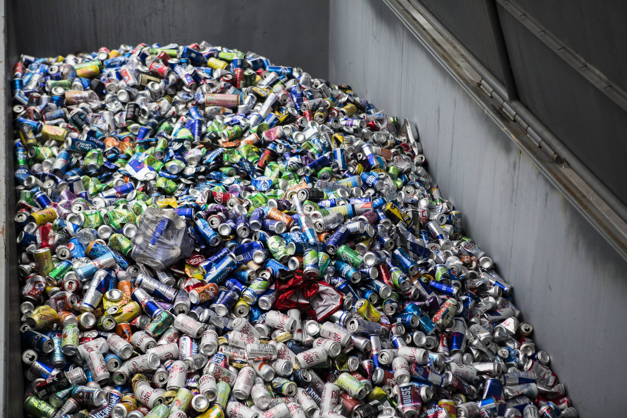 Aluminum cans fill a large recycling container at the Airport Road Recycling & Transfer Station on Nov. 24 in Everett. Photo by Olivia Vanni/The Herald (Everett)