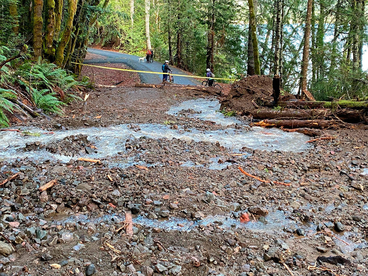 A washout blocks safe passage along the Spruce Railroad Trail. Olympic National Park officials noted the trail closure on Jan. 3, citing heavy rains as the cause of the landslide. Photos by Noel Carey