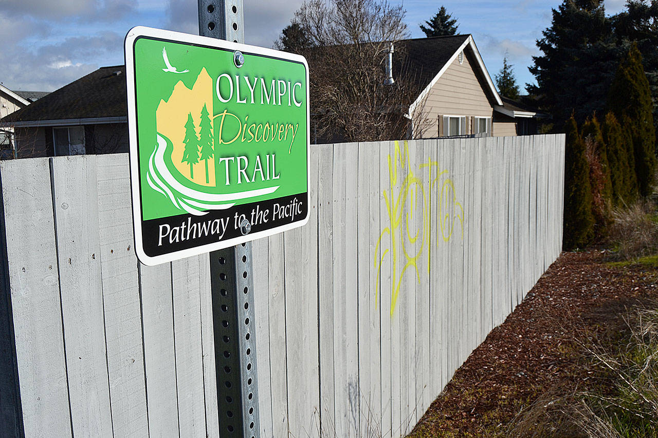 A fence at the intersection of Hendrickson Road and North Fifth Avenue was one of many places to be vandalized with graffiti. Sequim Police officials said they are investigating the incidents. Sequim Gazette photo by Matthew Nash