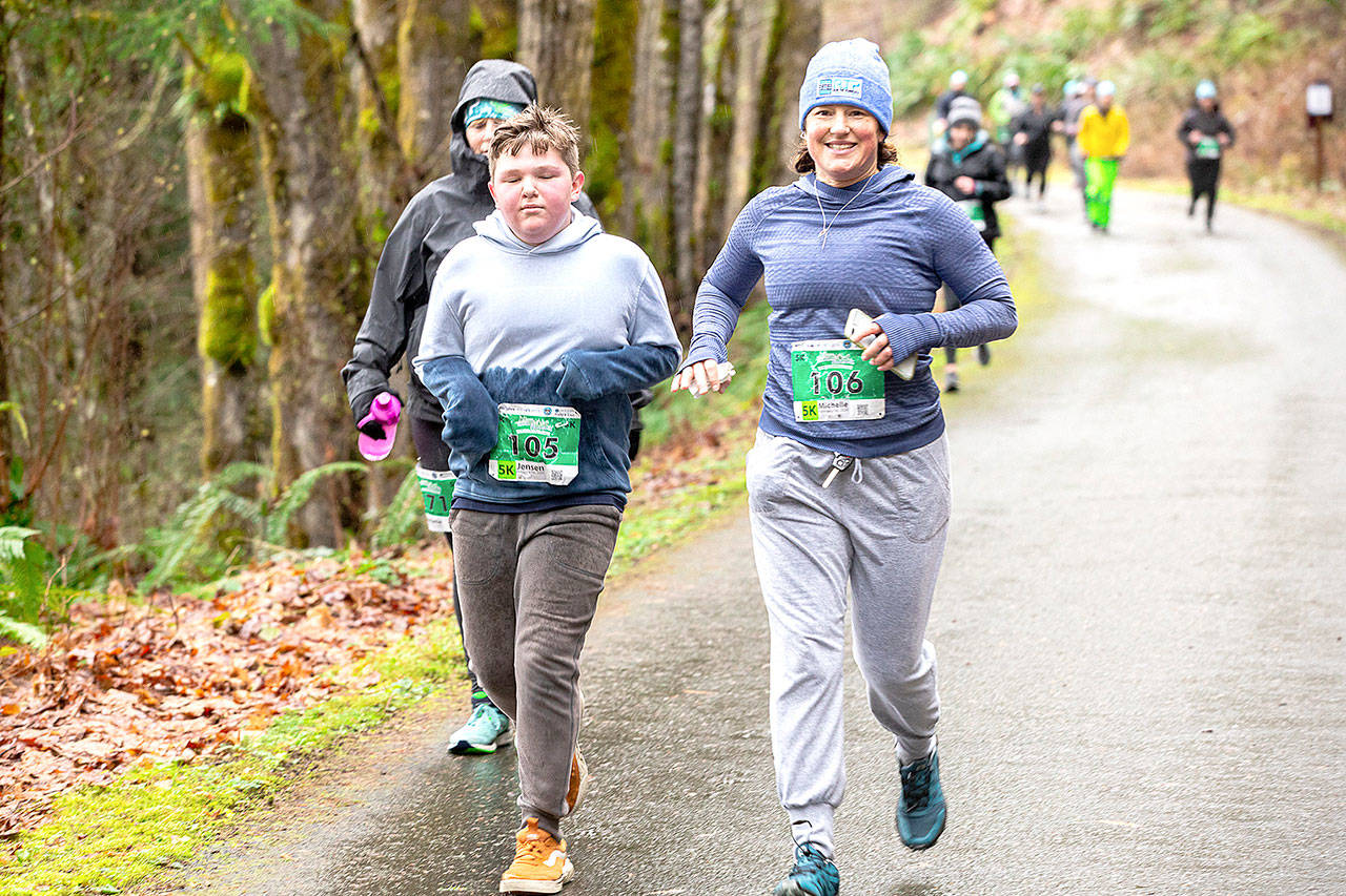 Jensen Wolfe, left, and Michelle Turner lead the pack in the 2020 Elwha River Bridge Run. The 2021 race will have a number of COVID-19 precautions, including racers being encouraged to stay 6 feet apart. Submitted photo