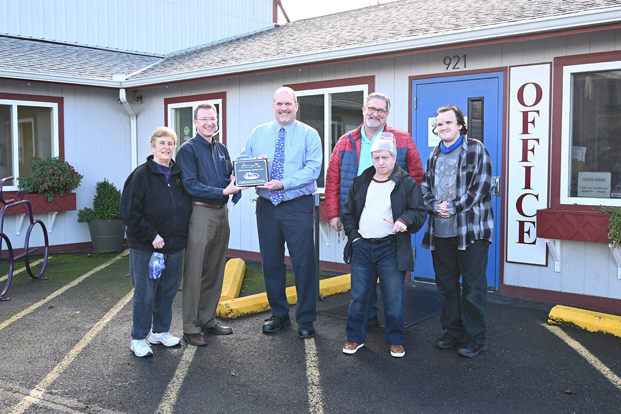Shipley Center representatives accept a 2020 Outstanding Employer Award for 2020 from Morningside. Pictured, from left, are Shipley Center board president Margaret Cox, Morningside president/CEO Jonathan Pleger, Shipley Center executive director Michael Smith, Morningside employment consultant Wayne Bartz (in back), Shipley Center employee Lee Bond and Shipley Center employee Kyle White. Sequim Gazette photo by Michael Dashiell