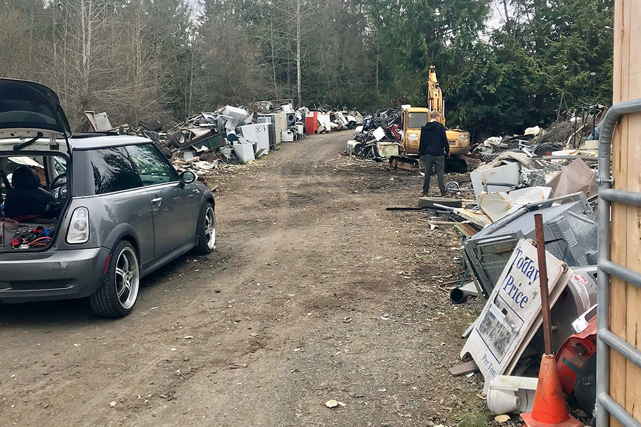 Paul Gottlieb/Peninsula Daily News

Tons of metal scrap are being hauled away from Midway Metals, avoiding enforcement action against its Port Orchard owner.