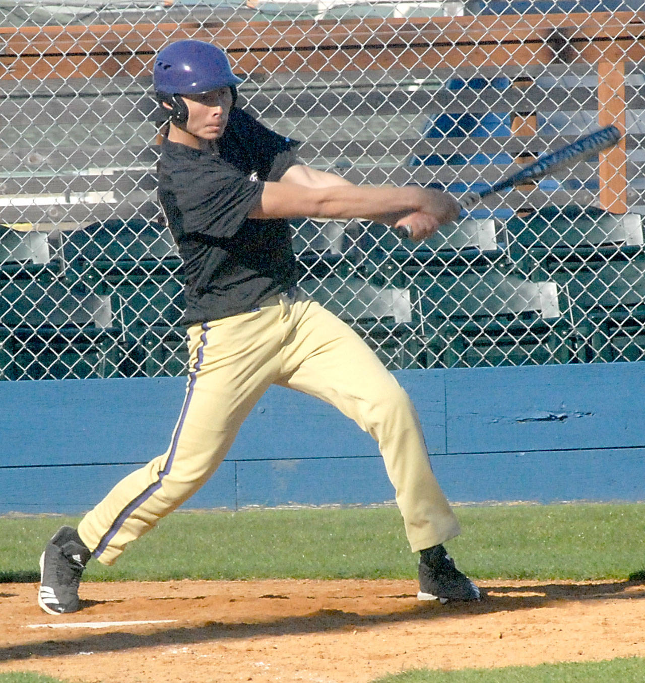 Sequim’s Isaiah Moore bats against Port Angeles on April 14 at Port Angeles Civic Field. Photo by Keith Thorpe/Olympic Peninsula News Group