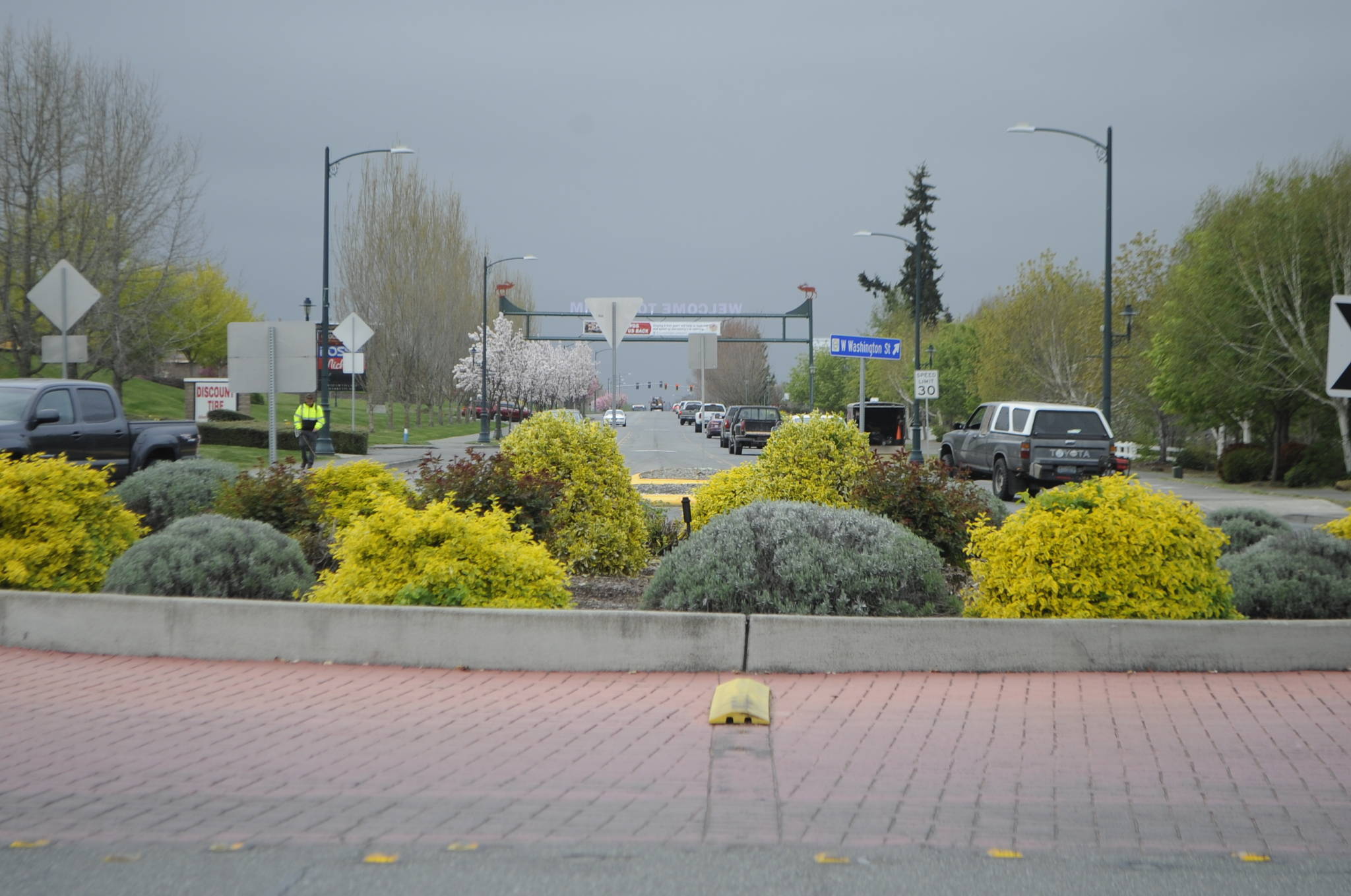 City staff look to pave a portion of Washington Street from the Ninth Avenue roundabout to the River Round roundabout this September using a federal grant. Sequim Gazette photo by Matthew Nash