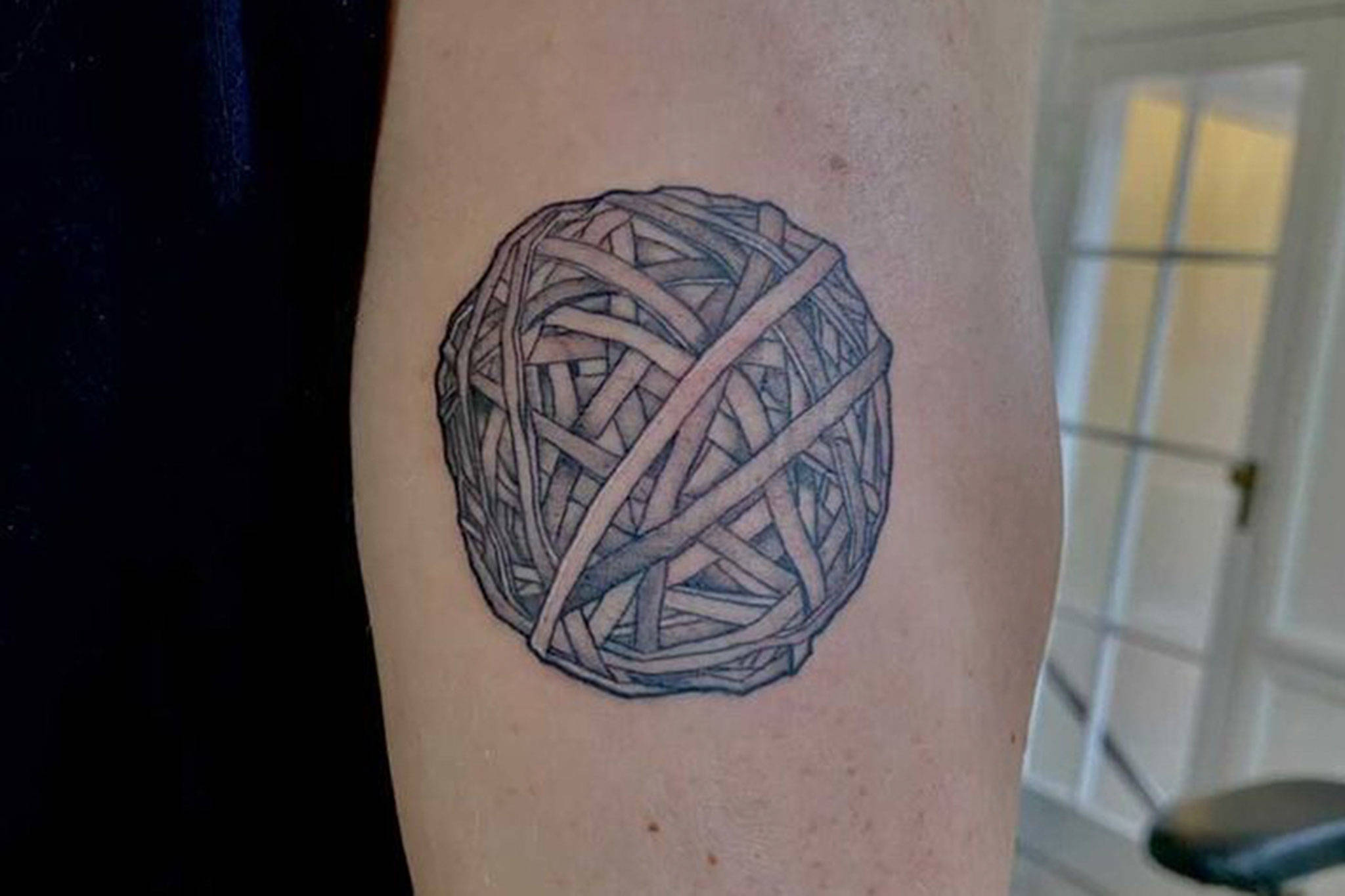 Jayson Brocklesby of Agnew received a free tattoo in Tacoma for his video adventure trying to make a 500 pound rubber band ball. He would only get the tattoo, he said, if 250,000 people liked the video. It took less than two hours to reach the goal, he said. Photo courtesy of Jayson Brocklesby