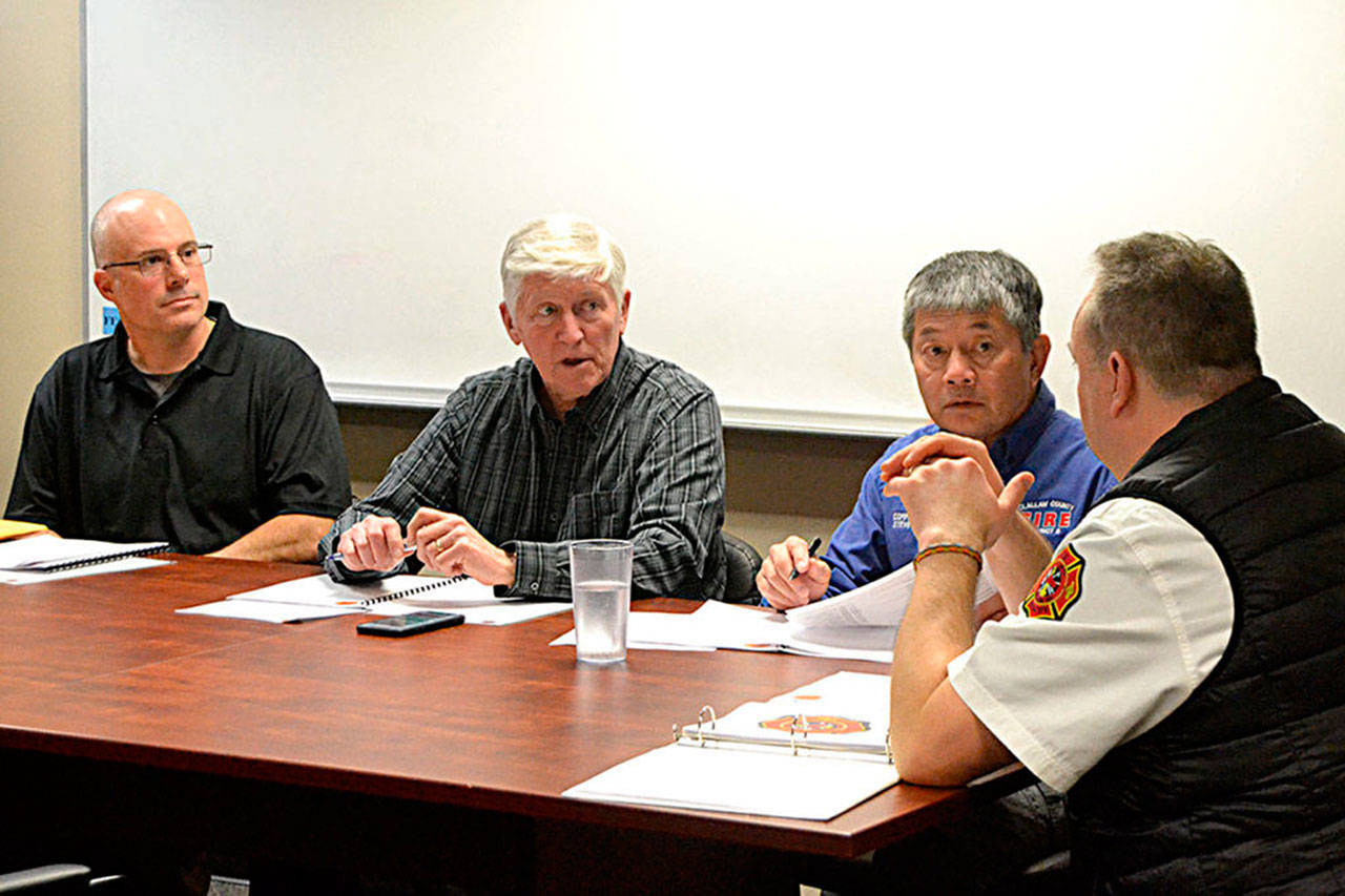 Clallam County Fire District 3 Fire Chief Ben Andrews, right, discusses 2019’s call load with fire commissioners, from left, Bill Miano, Mike Gawley and Steve Chinn on Jan. 7, 2020. Gawley recently announced he wasn’t seeking reelection in 20201. Sequim Gazette photo by Matthew Nash