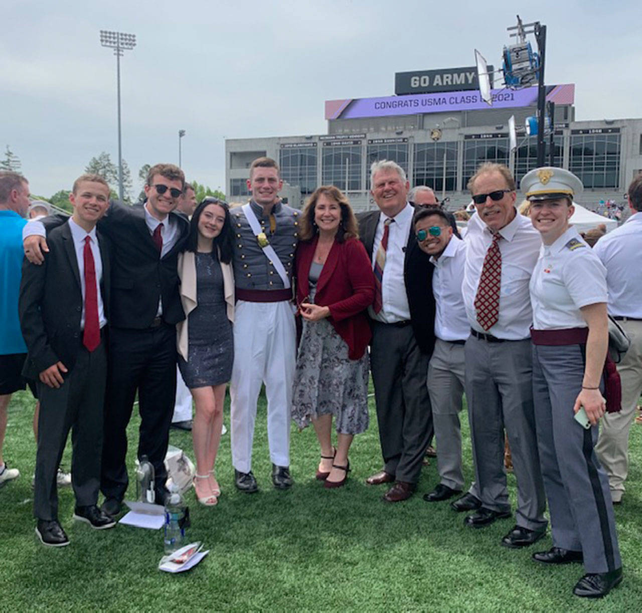 Sequim’s Grant Pierson, fourth from left, is joined by friends and family at his graduation ceremony at West Point on May 22. Photo courtesy of Pierson family