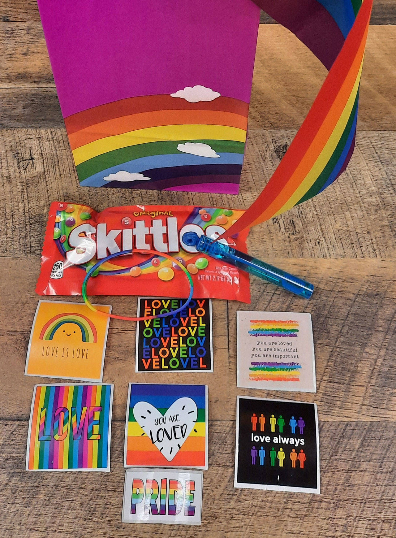 Starting June 7 and while supplies last, library patrons can celebrate Pride Month with a Pride Party Pack that includes a rainbow flag, bubbles, stickers, resources and more colorful items. Submitted photo
