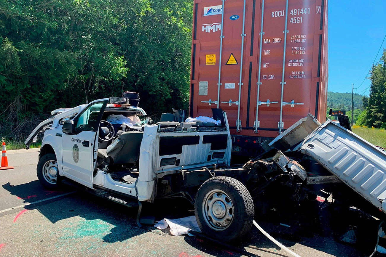 Two people were seriously injured and a Washington State Patrol Commercial Vehicle Enforcement Officer's vehicle was totaled in a collision near Discovery Bay on Tuesday. Photo courtesy of Washington State Patrol