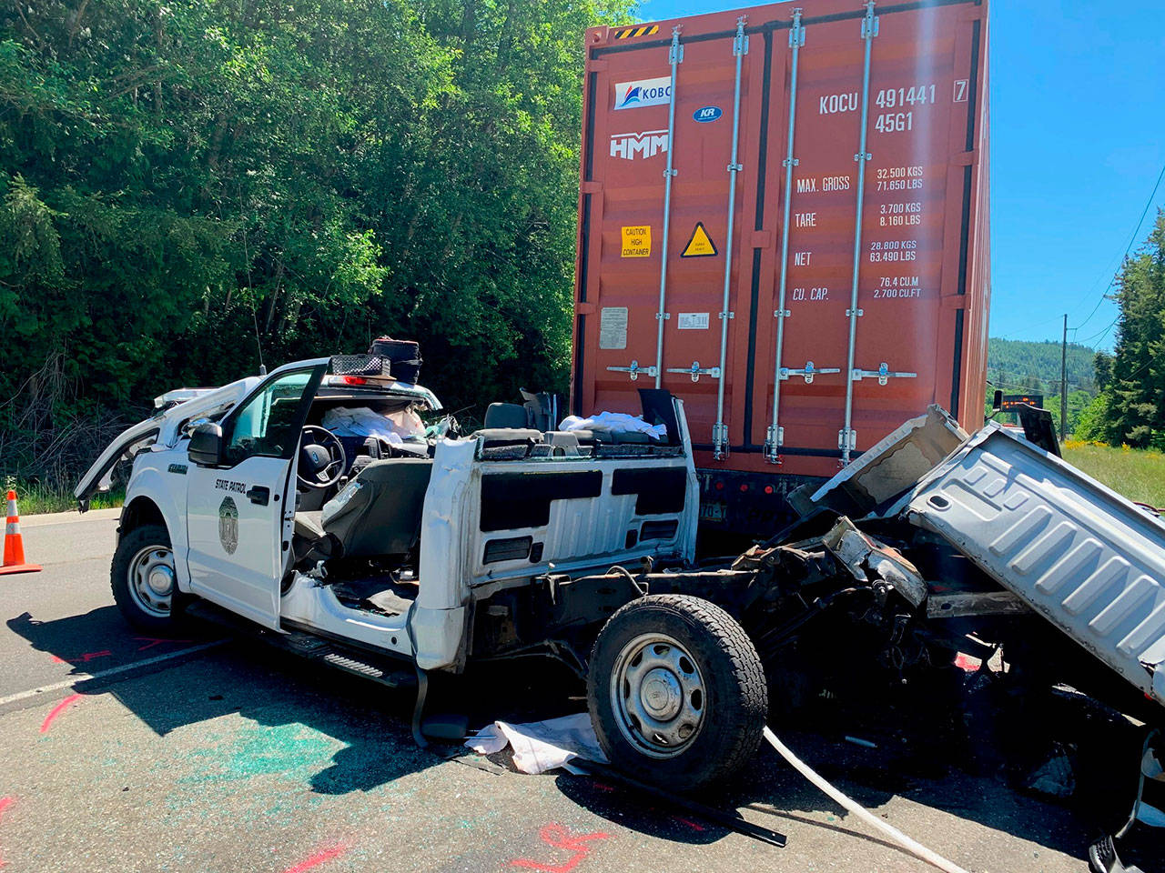 Two people were seriously injured and a Washington State Patrol Commercial Vehicle Enforcement Officer’s vehicle was totaled in a collision near Discovery Bay on Tuesday. Photo courtesy of Washington State Patrol