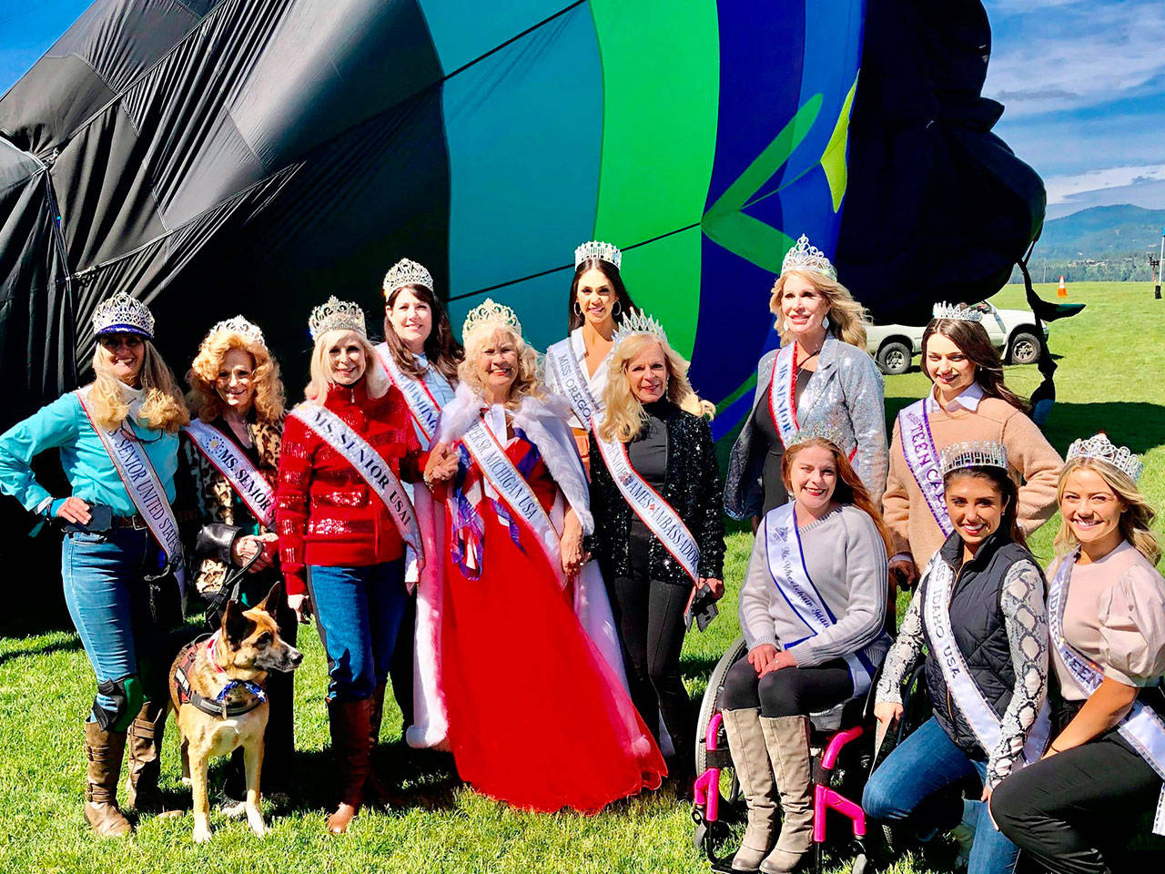 Various royalty through The Global Beauty Awards, including Captain-Crystal Stout, aka Ms. Senior United States, on far left, gathered for photo ops with the Dream Catcher Balloon in late May in Coeur d’Alene, ID. While too windy to fly, participants were able to sit in the balloon for photos. Submitted photo