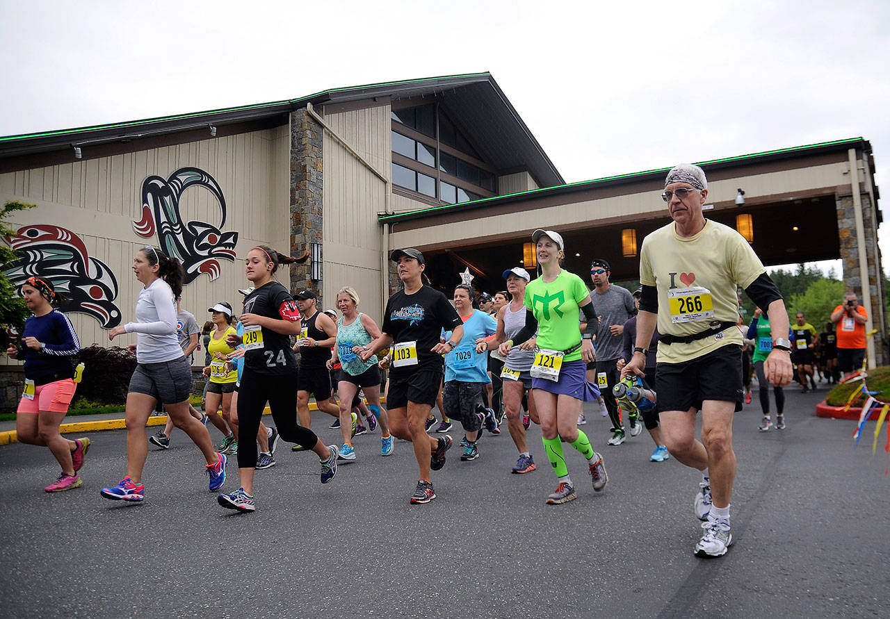 Runners break from the North Olympic Discovery Marathon starting line in 2017. This year’s event features a slightly modified course. The marathon and marathon relays will begin at 7:30 a.m. from 7 Cedars Casino in Blyn, and the half-marathon will begin at 8:30 a.m. at the Storm King Soccer Fields. Sequim Gazette file photo by Michael Dashiell
