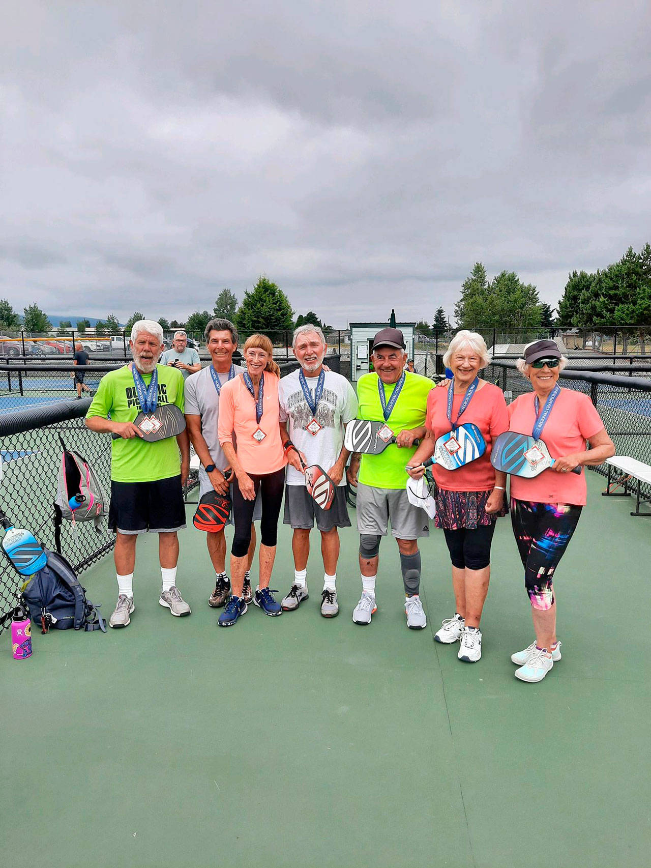 Sequim Picklers members from left, Steve Bennett, Richard Reed, Colleen Alger, John Herbolt, Bob Sester, Jeannie Ramsey and Beverly Hoffman were part of 14-strong Sequim Picklers contingent that competed at the 2021 USA Pickleball Pacific Northwest Regional Championship in Boise, Idaho, last month. Submitted photo