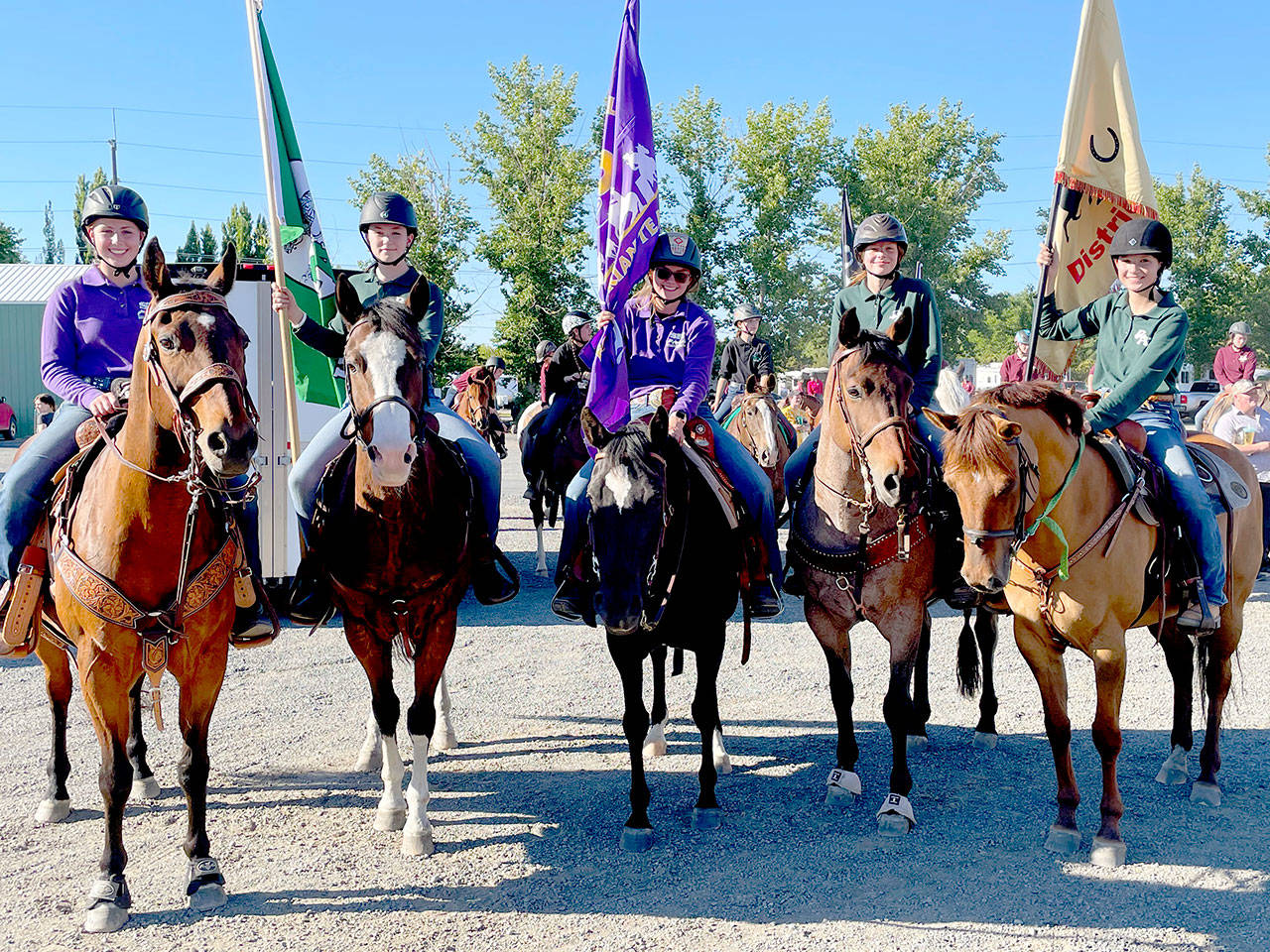 Local prep equestrian riders gear up for the Grand Entry at the state finals in Moses Lake in mid-June. They include, from left, Sequim rider Libby Swanberg, Port Angeles’ Sara Holland, Sequim’s Keri Tucker, and Port Angeles riders Amelia Kinney and Sidney Huttonn. Submitted photo
