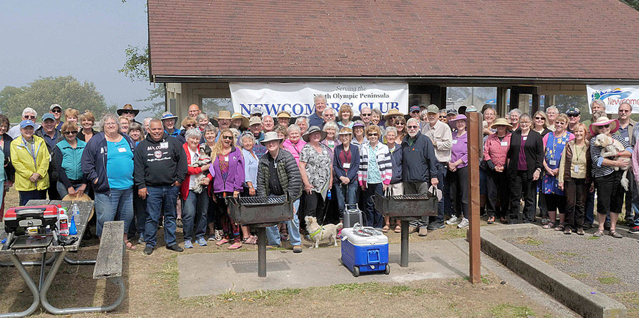 Attendees of the 2019 Olympic Peninsula Newcomers’ annual picnic enjoy some company. The group’s 2021 event is set for Aug. 3. Submitted photo