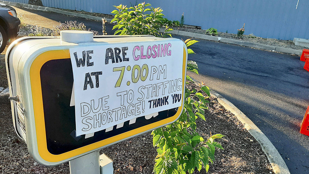 A sign announces reduced hours at Sequim’s Dairy Queen last week. Sequim Gazette photo by Michael Dashiell