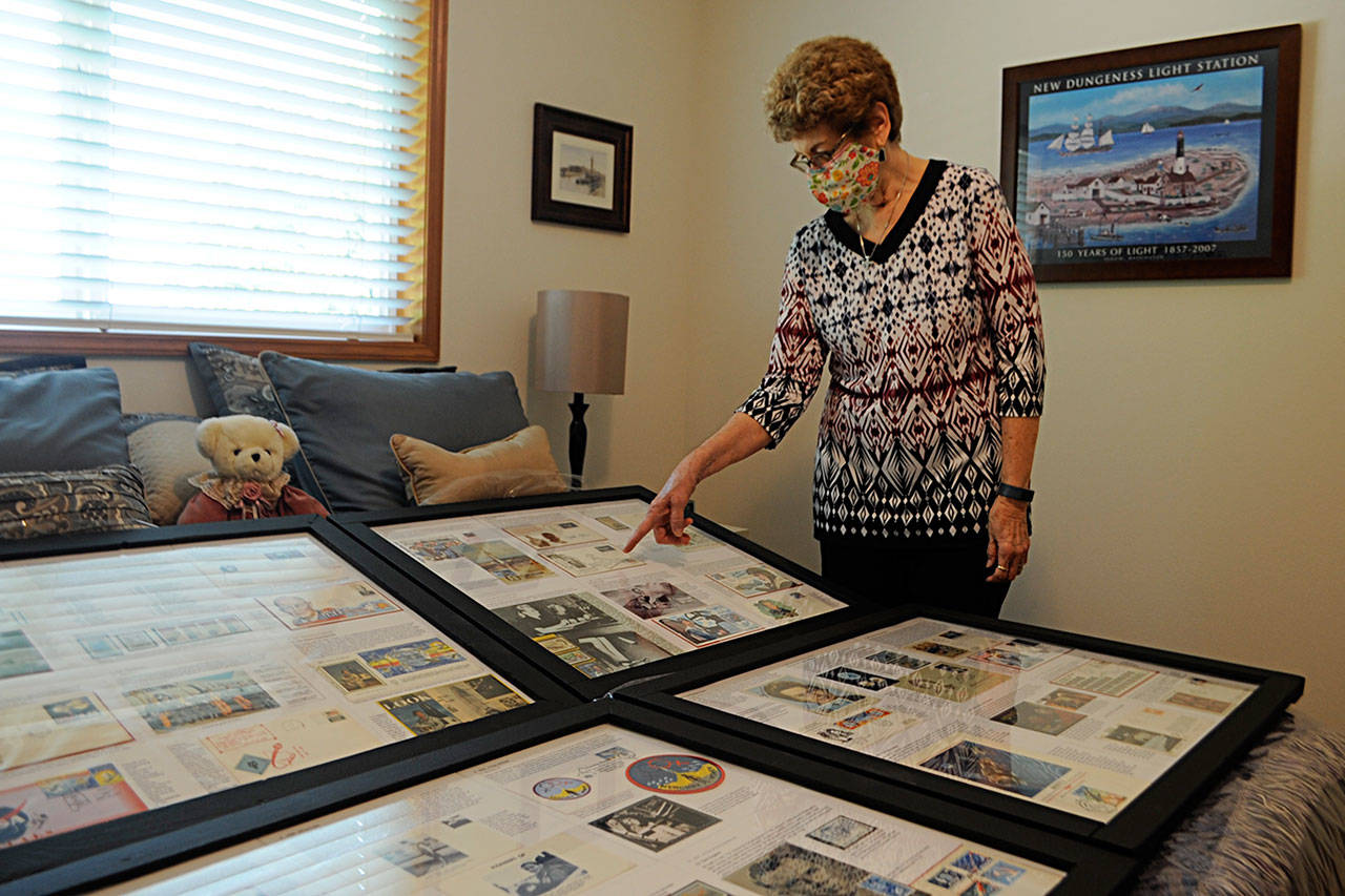 For the first time, Judy Newblom plans to put a stamp exhibit before professional judges next month. It profiles the role women played in the space race and highlights many female astronauts. She’ll preview it Saturday at the Strait Stamp Show in the Guy Cole Event Center. Below: It’s not uncommon for collectors to buy sets of stamps to obtain just one stamp, said Vera Felts. She bought this set of six for one lavender stamp. Sequim Gazette photos by Matthew Nash