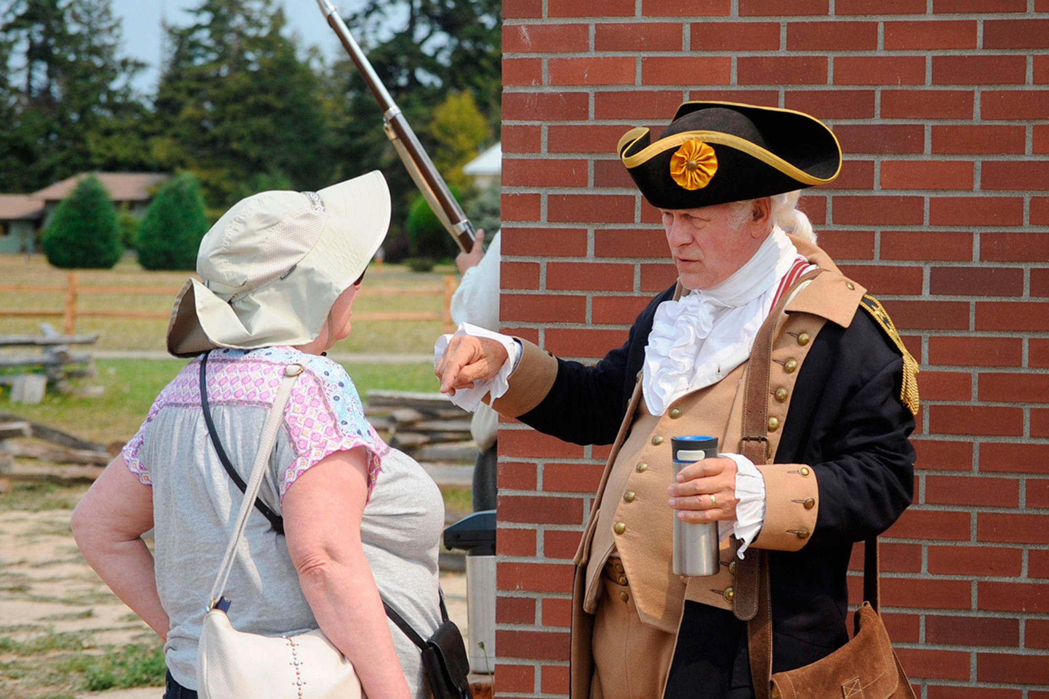George Washington (Vern Frykholm Jr.) greets visitors Aug. 14 to the Northwest Colonial Festival. Frykholm, a staple of the festival since its inception, said he was happy with the turnout for the event.