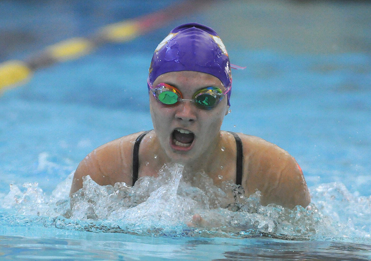 Sequim’s Melanie Byrne swims the breaststroke portion of the Wolves’ 200 medley relay in a Sept. 9 season-opening meet against 3A powerhouse Bainbridge. Sequim Gazette photo by Michael Dashiell