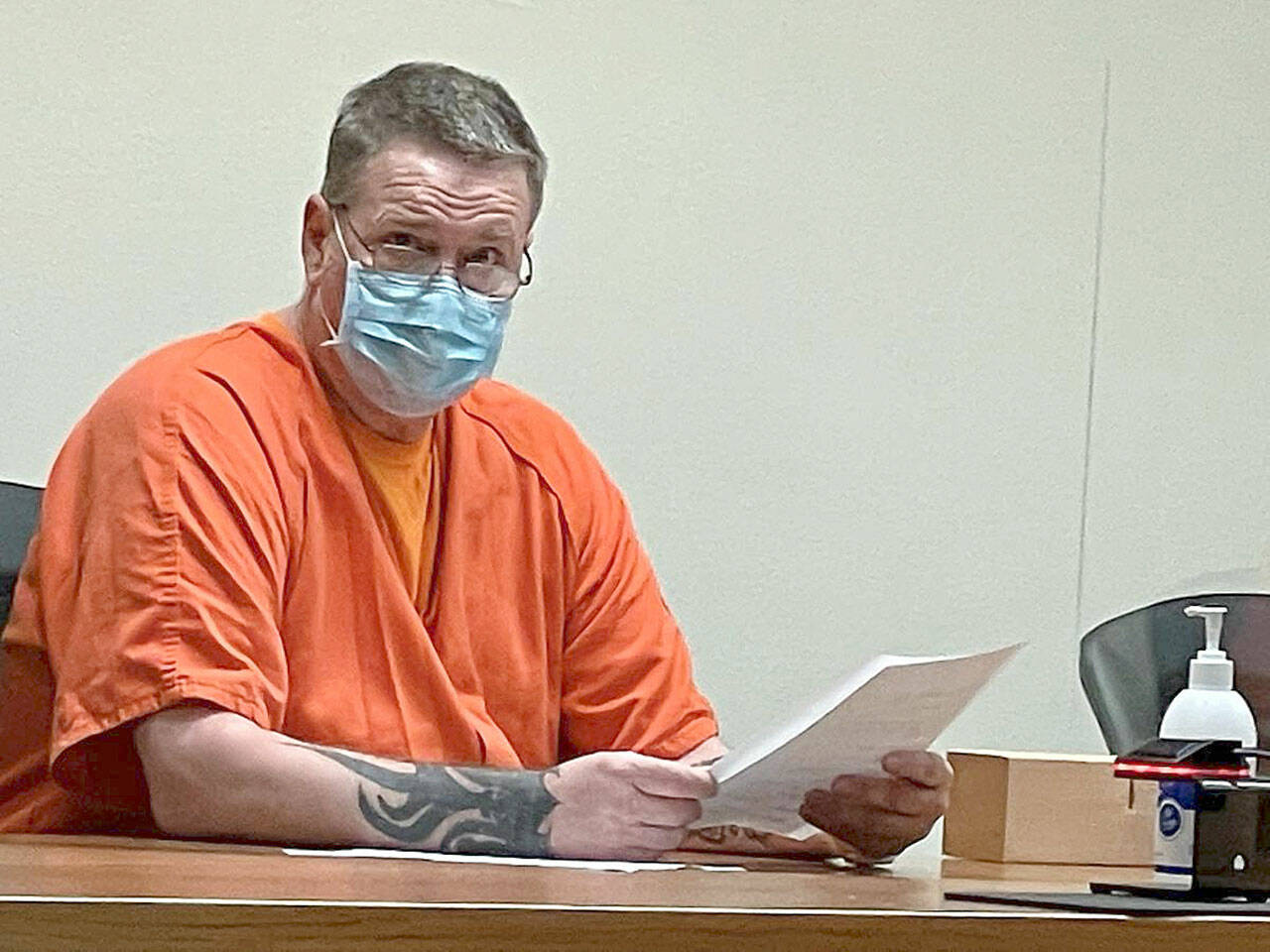 Dennis Bauer, charged with three counts of aggravated first-degree murder, is pictured at an Aug. 17 Clallam County Superior Court hearing. File photo by Paul Gottlieb/Olympic Peninsula News Group