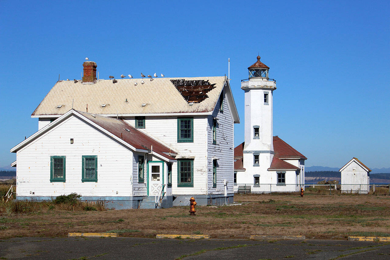 The U.S. Lighthouse Society is hosting a kickoff event at 3 p.m. Tuesday, Sept. 28, at the Point Wilson Lighthouse to highlight the next phase of renovations for the lighthouse and its two dwellings. Photo by Zach Jablonski/Olympic Peninsula Daily News Group