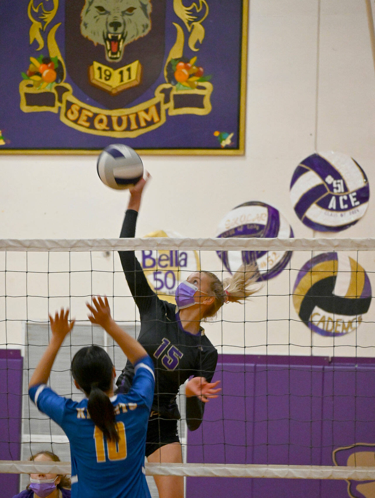 Sequim’s Kendall Hastings hammers down a point past Bremerton’s Yume Ishizaka in the second set of a three-game sweep over the visiting Knights on Oct. 19. Sequim Gazette photo by Michael Dashiell