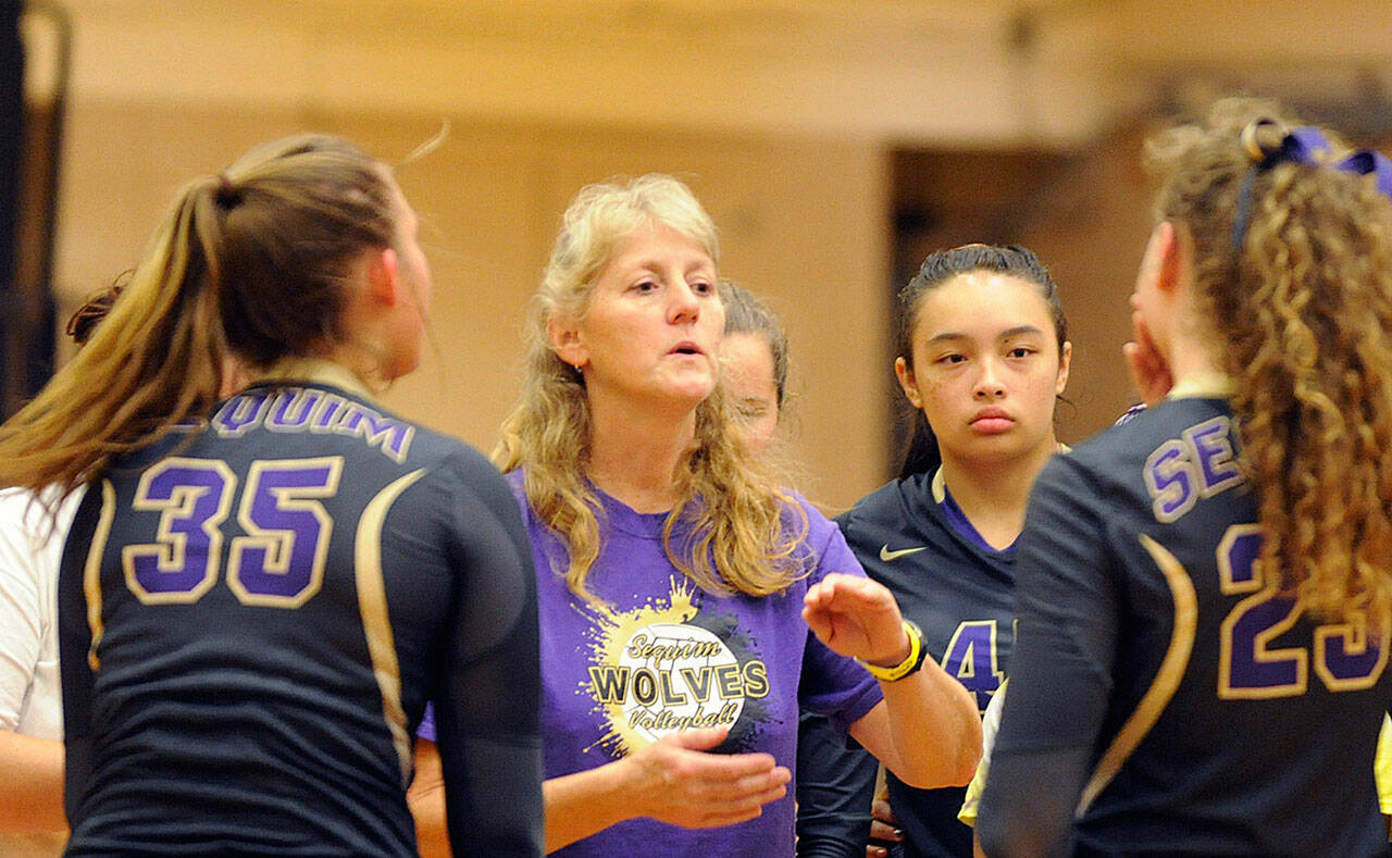 Sequim head coach Jennie Webber Heilman talks with her team at the 2016 state 2A tournament. The Wolves were back at the tourney this past weekend. Sequim Gazette file photo by Michael Dashiell