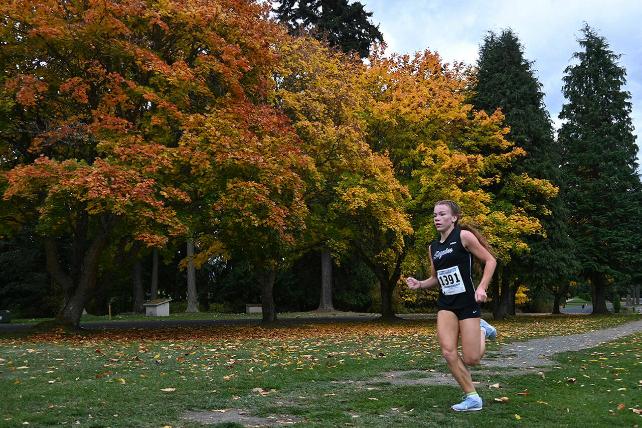 Sequim’s Riley Pyeatt races to a first place finish at the Olympic League championships on Oct. 21. Pyeatt won the district championship nine days later. Sequim Gazette photo by Michael Dashiell