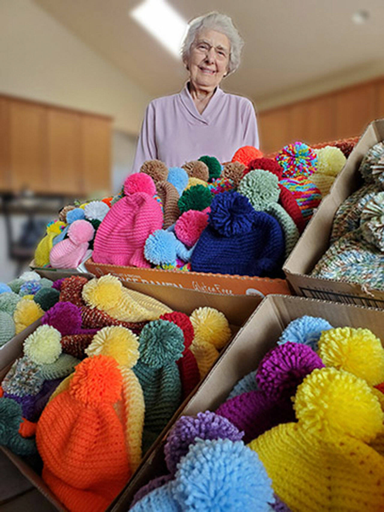 Twila Guengerich, Sequim, has crocheted more than 100 warm caps this year to be delivered to needy children around the world by Operation Christmas Child. Submitted photo