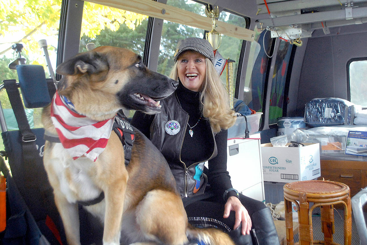 Captain-Crystal Stout and therapy dog Lucee. Photo by Keith Thorpe/Olympic Peninsula News Group
