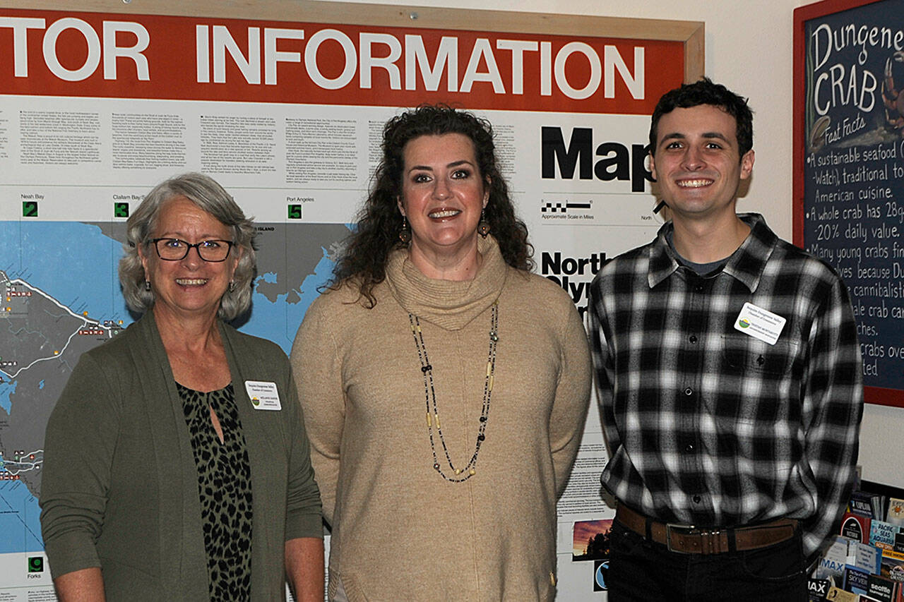 Beth Pratt, in center, started on Nov. 15 as the new executive director of the Sequim-Dungeness Chamber of Commerce. Here she stands with fellow staffers, Melanie Sands, financial administrator, and Tristan Mortarotti, membership manager. Not pictured, Madelyn Pickens, support specialist. Sequim Gazette photo by Matthew Nash