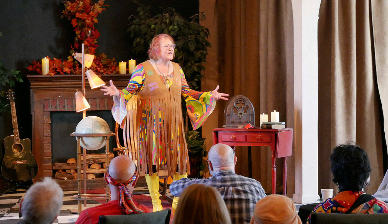 Star Pittman, organizer of Olympic Theatre Arts Center’s Tale Spinners, tells a “scary story” at the debut of the 2021-2022 Tale Spinners series just before Halloween. Photo courtesy of Olympic Theatre Arts Center