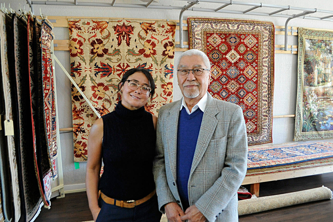 For five years, Mohammad Amin Rahmati has repaired, washed and sold rugs through his Oriental Rug Care on Bell Street. He and his family, including daughter Muzghan “Muzgi” left Afghanistan in 1980 during the Soviet-Afghan War and eventually arrived in Los Angeles on Christmas Day 1982. He’s carried on a family tradition with rugs. Sequim Gazette photo by Matthew Nash